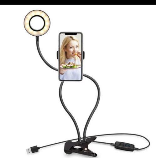 This is a mini ring light good for selfies and for your YouTube videos. It holds the phone very well and it is a light weight product that is easily transportable. You can also connect your USB.
