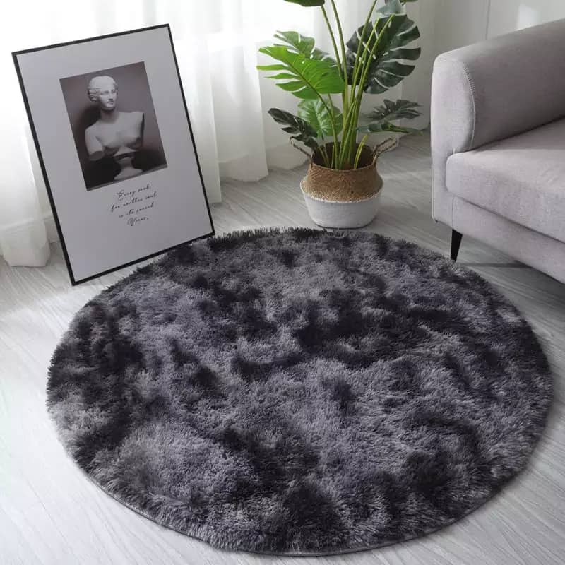 This carpet is very good for your parlor or sitting room. It makes your parlor or sitting room looks attractive. It comes round and there are multiple colors precisely white and grey ash color.