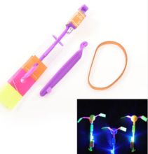 Flash Rotating Flying Arrow Toy Elastic Powered LED