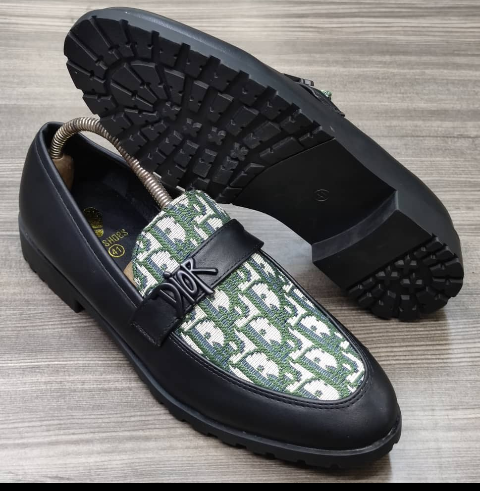 This is an outstanding pair of shoes. It is unique and comes unique. Made up of flexible leather. This shoe makes one looks attractive and presentable for any occasions. It can be used for office and any other celebrations one plan to attend. The soles are very strong and solid and it has a round front and the top is made of of multi-colors. Available size 43 - 45.