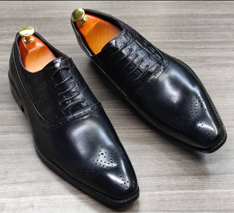 This is a nice pair of black shoes. It is unique and comes unique. Made up of quality material This shoe makes one looks attractive and presentable for any occasions. It can be used for office and any other celebrations one plan to attend. The soles are very strong and solid and it has a round front. The ropes are solid ropes. Available size 40 - 45.