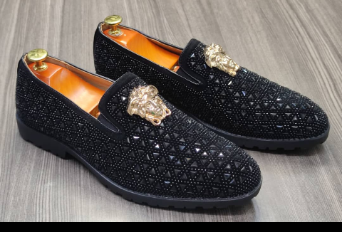 This is a nice pair of black shoes. It is unique and comes unique. Made up of quality material This shoe makes one looks attractive and presentable for any occasions. It can be used for office and any other celebrations one plan to attend. The soles are very strong and solid and it has a round front. Available size 42 - 44.