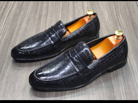 This is a nice pair of black shoes. It is unique and comes unique. Made up of quality material This shoe makes one looks attractive and presentable for any occasions. It can be used for office and any other celebrations one plan to attend. The soles are very strong and solid and it has a round front. Available size 40 - 45.