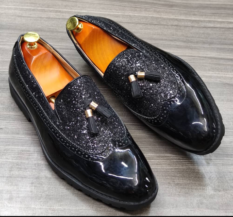 This is a nice pair of black shoes. It is unique and comes unique. Made up of quality material This shoe makes one looks attractive and presentable for any occasions. It can be used for office and any other celebrations one plan to attend. The soles are very strong and solid and it has a round front. It has buckles at the sides. Available size 40 - 45.