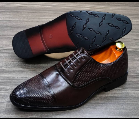 This is a beautiful pair of dark brown shoe. It is unique and comes unique. This shoe makes one looks attractive and presentable for any occasions. It can be used for office and any other celebrations one plan to attend. The soles are very strong and solid and it has a round and dark front. Available size 40 - 43.