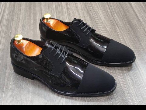 This is an outstanding pair of black shoes. It is unique and comes unique. Made up of leather at all the sides. This shoe makes one looks attractive and presentable for any occasions. It can be used for office and any other celebrations one plan to attend. The soles are very strong and solid and it has a round front. Available size 40 - 45.