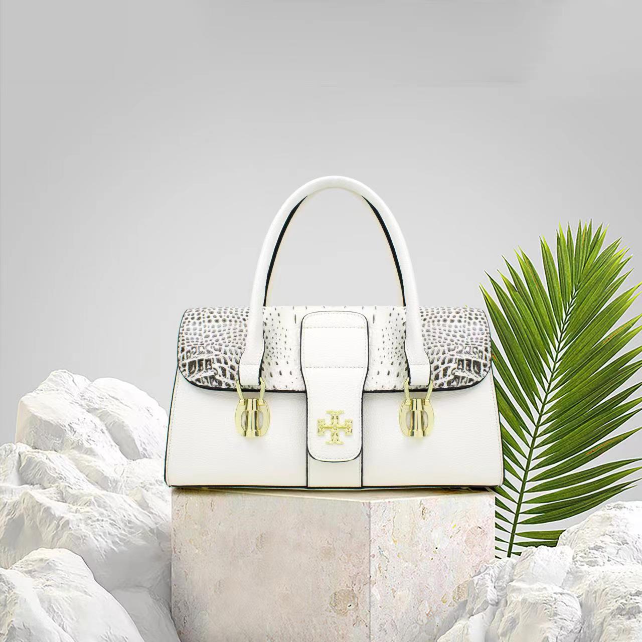 This is a quality female hand bag. This hand bag is very solid and can last for a very long time. It is a flexible bag and easy to carry along. The leather is of great quality and the bag comes in different colors.  