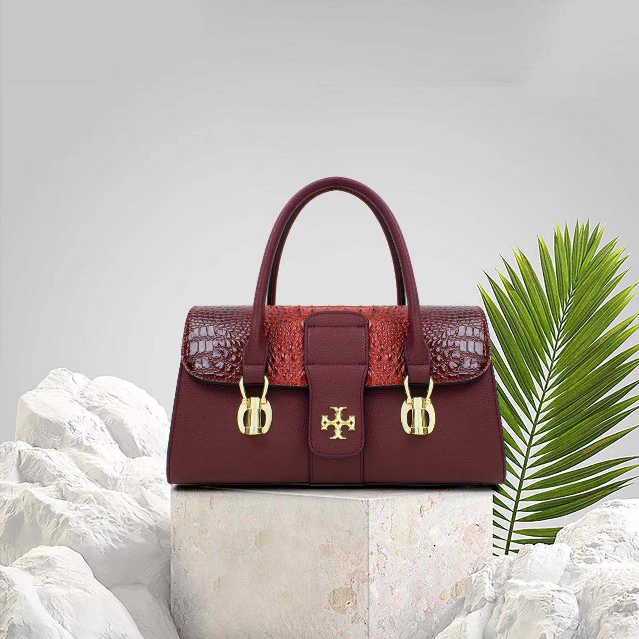 This is a quality female hand bag. This hand bag is very solid and can last for a very long time. It is a flexible bag and easy to carry along. The leather is of great quality and the bag comes in different colors.  