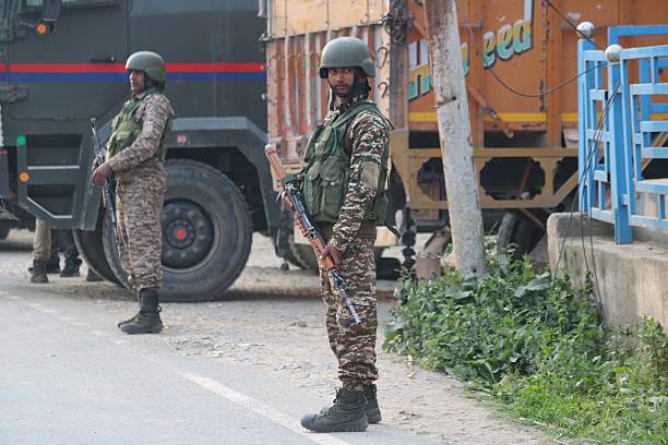 Security forces guard the street near the Wuyan area of Pampore in south Kashmir, where a reportedly unknown fighter jet has fallen, as India carries out strikes on Pakistan in Pampore, Jammu and Kashmir, India, on May 7, 2025. The death toll from Indian strikes on Pakistan increases to eight, the country's military spokesman says on May 7, as India fires missiles at Pakistani territory and Islamabad vows to ''settle the score''. (Photo by Firdous Nazir/NurPhoto via Getty Images)